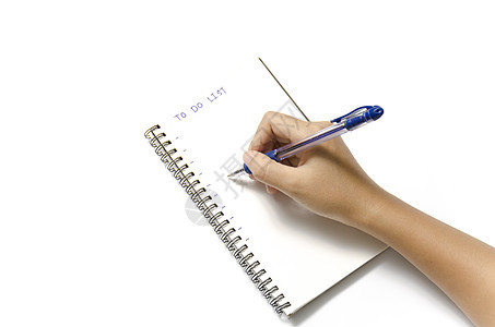妇女用笔笔在笔记本上的手写笔记记事本教育写作铅笔文档商业手指女士空白图片