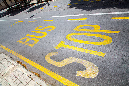 巴士站旅行街道标签运输沥青地面城市民众路面黄色图片