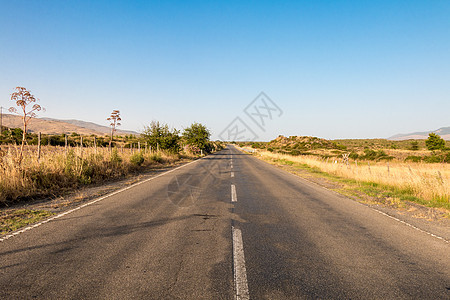 孤独路驾驶运输太阳海岸海滩沙漠风景地平线车道环境图片