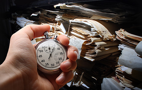 堆放在归档中的纸张文档历史时间命令时间表架子手表目录贮存跑表团体图片
