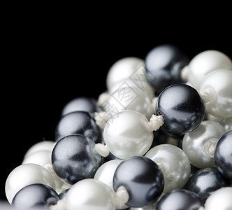 黑珍珠和白珍珠的弦细绳白色项链圆形财富珍珠奢华魅力宝藏珠宝图片