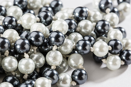 黑白珍珠的弦珠子魅力礼物奢华财富团体珠宝圆形女性化宝石图片