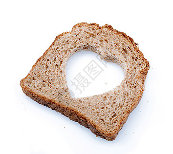 面包片中的心形洞白色小麦假期早餐装饰生活宏观食物活力框架图片