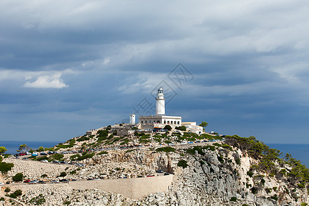 西班牙马赫卡岛的灯塔导师天空假期太阳地标悬崖侵蚀海岸线海洋蓝色图片