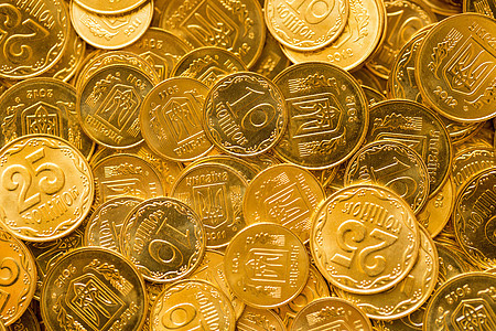 硬币的背景金融现金金属青铜金子黄色成功经济储蓄宝藏图片