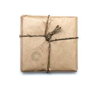 包裹包装着棕色克拉叶纸 在白色后方格罗上被孤立空白商业邮件货运工艺褐色标签运输细绳正方形图片