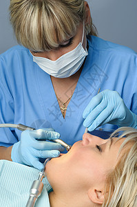 有病人的牙医 牙科钻牙保健诊所检查牙疼萃取女性手套口服养护外科图片