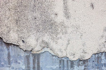 混凝土墙上旧被损坏的白漆 有丰富的纹理建筑裂缝材料石灰水风化砂浆石墙石灰边缘水泥图片