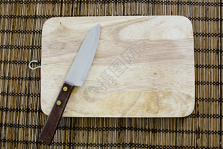 在现实生活中 日本烹饪用刀和切菜板边缘刀刃技巧木头美食市场质量厨师金属工具图片
