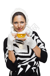 穿着黑白冬装的优雅女人围巾针织女士时间输液白色杯子针织品饮料休息图片