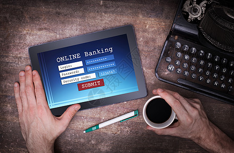 在线银行在平板电脑上桌子屏幕密码商业网络蓝色交易金融互联网咖啡图片