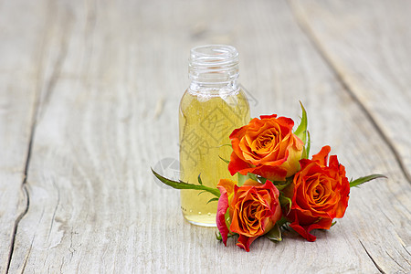 浴油和橙色玫瑰温泉奢华治疗平衡液体环境冥想植物药品芳香图片