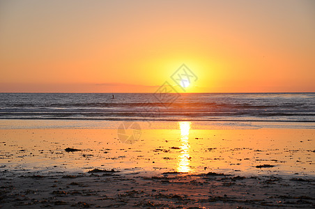 加利福尼亚卡迪夫州海滩太平洋上空日落 地点支撑旅行岩石金子海滩场景旅游太阳蓝色天空图片