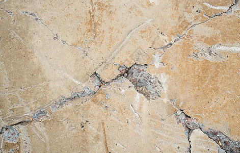 碎裂的混凝土表面岩石石墙裂缝水泥苦恼墙纸石头材料建筑接缝图片