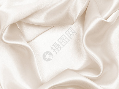 优雅的金丝绸作为婚礼背景 在塞皮亚布料版税奶油折叠丝绸窗帘折痕织物海浪涟漪图片