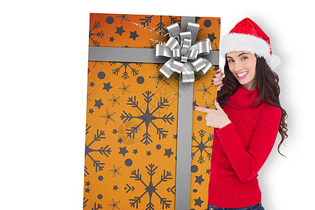 干发帽在圣塔帽中微笑的棕发黑发人 喜悦礼品卡的复合图像背景