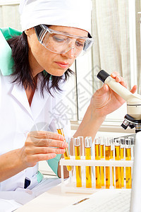 女科学家科学实验工作学生化学烧杯医院试管实验室管子背景图片