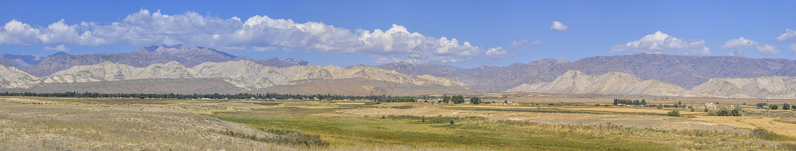 吉尔吉斯斯坦全景丘陵草原风景山脉水平绿色图片