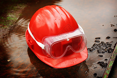 红头盔工作工业警卫危险齿轮安全衣服风镜警告事故图片