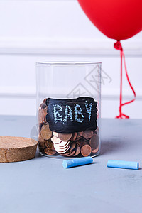 硬币罐退休基金新生薪水硬币金融婴儿财富银行业玻璃图片