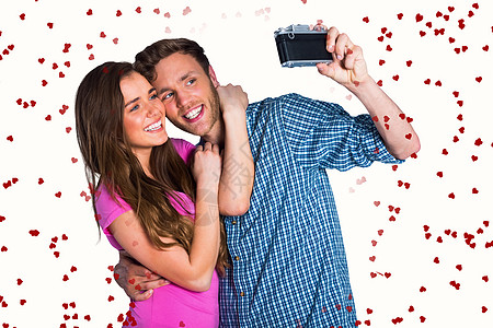 情侣用数码相机自拍的复合图像Name绘图计算机摄影数字快乐男朋友男性夫妻女士男人图片