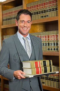 律师在法律图书馆阅读书教育学校男性学习法律男人校园图书馆大学高等教育背景图片