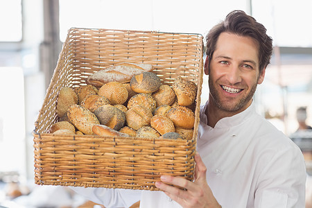 贝克展示一篮面包商业制服白人职员职业饮食微笑大楼酒店厨师图片