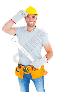 微笑的杂人保持精神水平防护男性男人安全帽工作手套技术员工人服装体力劳动图片