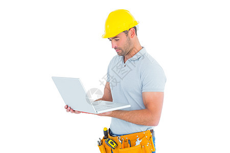 使用膝上型电脑的杂工安全职业保护修理工头盔体力劳动安全帽工人男人男性图片