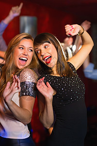 朋友一起玩乐快乐夜生活喜悦享受娱乐派对微笑酒吧友谊跳舞女士图片