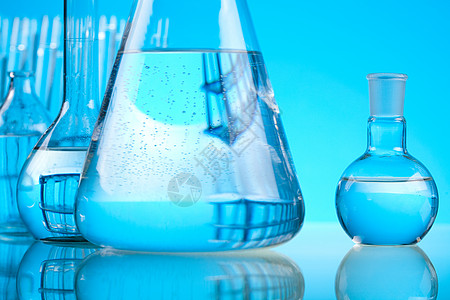 瓶子水实验室玻璃杯 明亮的现代化学概念生物测量医学蓝色技术保健烧杯考试试管瓶子背景