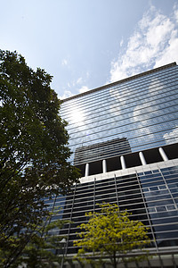 现代商业建设 自然色彩多彩的音调建筑学窗户金融银行摩天大楼办公室蓝色公寓天空景观图片