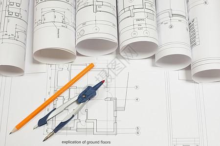 绘图指南针 铅笔和建筑绘画卷轴图片