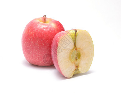 甜苹果 白切片分离白色石头甜点红色植物叶子树叶饮食食物绿色图片