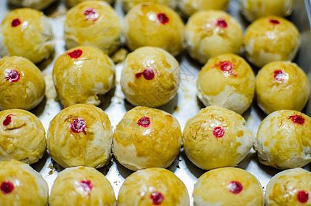 中国糕点或月饼 中国节日甜点面包面团季节面粉食物工具蛋糕美食庆典圆圈图片