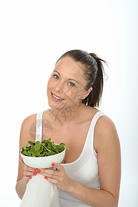 健康青年女子举行一碗菠菜冒充重量数码单反女士照片女性蔬菜饮食成人图片