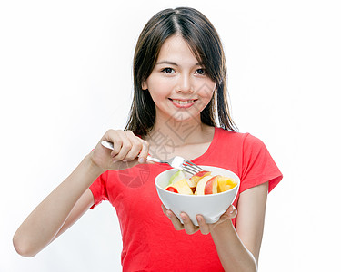 拿着一碗水果的中国女人女士微笑素食主义者厨房女性食物白色饮食美丽营养图片