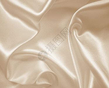 平滑优雅的金色丝绸或西边纹理作为背景奶油版税材料婚礼新娘纺织品织物棕褐色折叠折痕图片