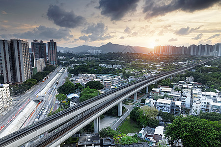 长平 黄昏时香港市中心市区城市公共汽车曲线场景速度技术穿越车辆路口立交桥图片