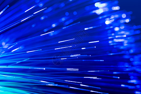 蓝色光纤抽象光纤抽象模糊的技术背景 技术背景全球光学电讯网络黑色电脑数据电子电缆互联网背景