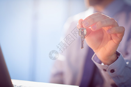 显示密钥的商务人士技术笔记本人士职业套装男性男人商务钥匙公司图片