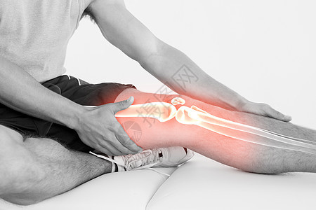 受伤男子高压膝盖医疗双手骨骼男人保健卫生男性皮肤痛苦腿痛图片