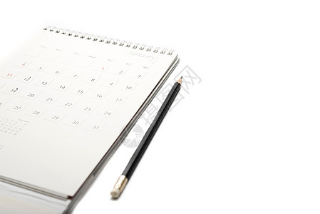 日历和铅笔圆圈日记白色办公室时间假期会议床单数字宏观图片