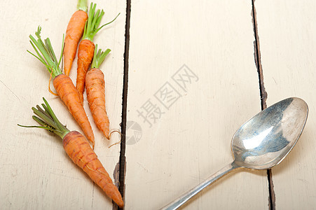 婴儿胡萝卜萝卜营养饮食木头收成蔬菜素食色彩绿色橙子图片