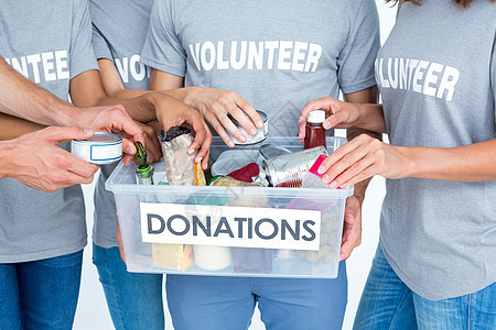 志愿人员朋友将捐赠物品分离开来志愿者福利消化道产品盒子团队服务团结道德机构图片