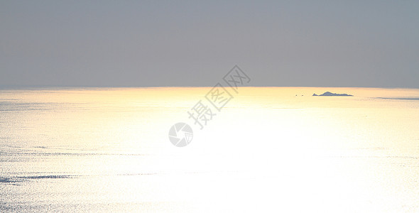日落在海中海滩海洋海岸线晴天旅行太阳天气橙子热带假期图片