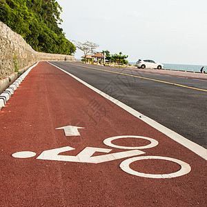自行车路标志牌路线车道运输运动街道小路沥青交通速度地面图片