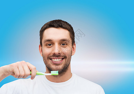 带着牙刷微笑的年轻人牙科保健口服福利增白剂牙齿擦洗拉丁风俗蓝色图片
