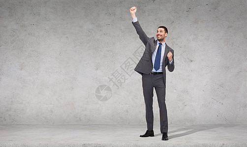 快乐的商务人士举手企业家成就老板领导者拉丁领带微笑男人商业套装图片