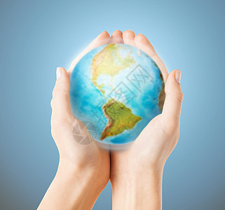 人手与地球相近蓝色女孩环境行星男人地理手掌杯状机构全世界图片